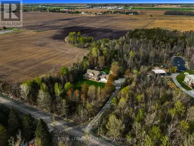 6343 Proven Line Road is a masterfully crafted stone & cedar estate on 5.05 private acres of mature...