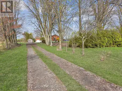 Check out this freshly painted all-brick bungalow with 2900 sq ft of living space on 2.9 private acr...