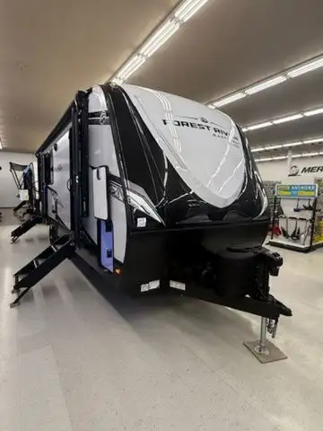 This popular midsize couples trailer won't last long. It features a king bed in the master, a huge w...