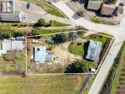 Huge .6 acre development property with views newly zoned RM5 medium density with future business/apa...