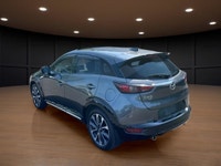 Get ready to conquer the roads with the 2022 Mazda CX-3 GT, a sophisticated gray SUV that combines a... (image 7)