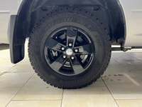 The 2023 Ram 1500 Classic SLT, with its stunning silver finish and robust 44 drivetrain, effortlessl... (image 9)
