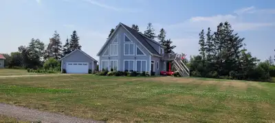 Major PRICE Reduction!! Custom Built Top Quality Home only 3 years old on PEI 's North shore within...