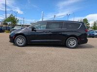 The 2026 Chrysler Grand Caravan SXT in Diamond Black Crystal Pearl with a Black interior offers a bl... (image 2)