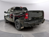 Drive into the future with the stunning 2026 Ram 1500 Sport 4x4 Crew Cab, wrapped in a sleek black e... (image 2)