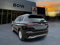 The 2026 Mitsubishi Outlander SE S-AWC in a striking exterior color pairs All-Wheel Drive with excep... (image 6)