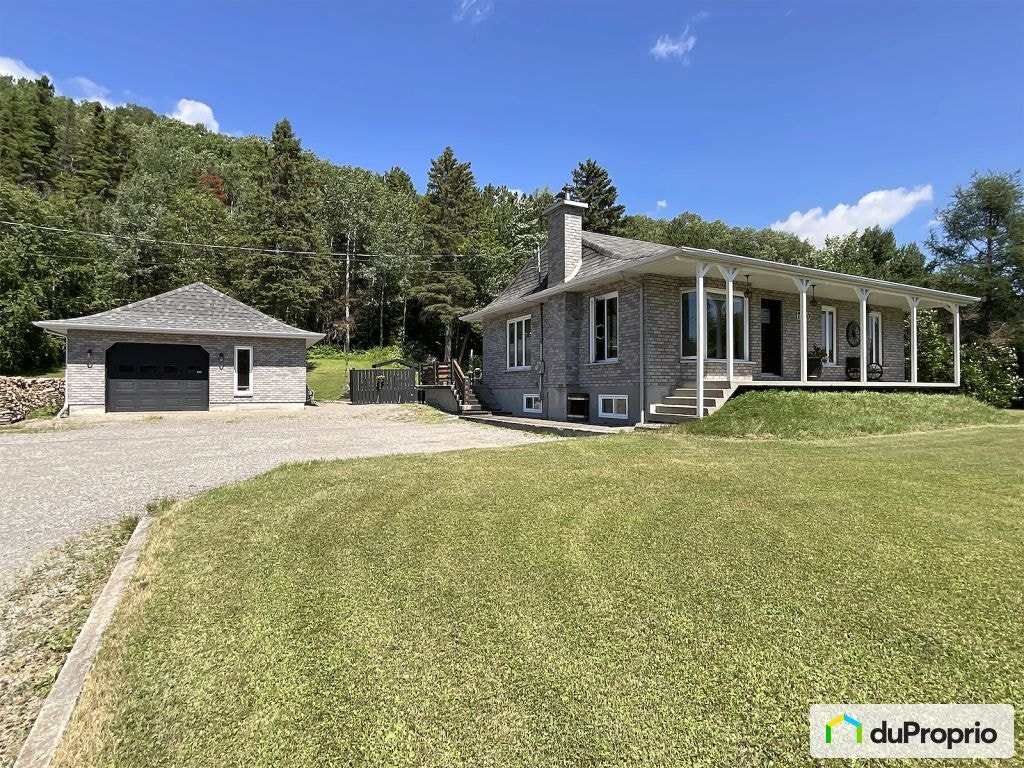 $550,000 - Bungalow for sale in Chicoutimi (Laterrière) — photo 1