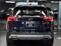 The 2021 INFINITI QX50 Essential is a premium-mid-level trim that elevates the compact luxury SUV ex... (image 5)