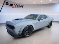 The 2022 Dodge Challenger Scat Pack boasts a roaring 392 Hemi engine paired with a manual transmissi... (image 4)