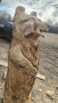 5 and a half foot tall chainsaw carved bear