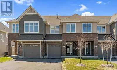 Welcome to executive family living in this stunning 2021-built TAMARACK Brock Model townhome nestled...