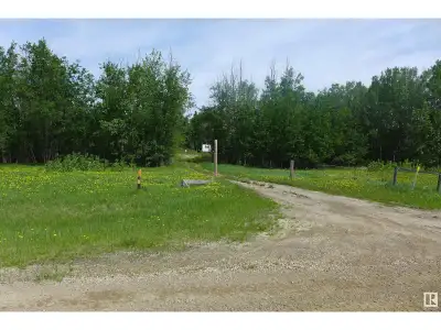 THIS SUPERB TREED 8.52 ACRES FRONTS HWY 16 AND 45 MINUTES FROM EDMONTON AND A FEW MINUTES FROM FOUR...