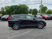 "• Power_Steering • Power_Brakes • Power_Windows • Power_Mirrors • Power_Locks • Power_Sunroof • Key... (image 5)