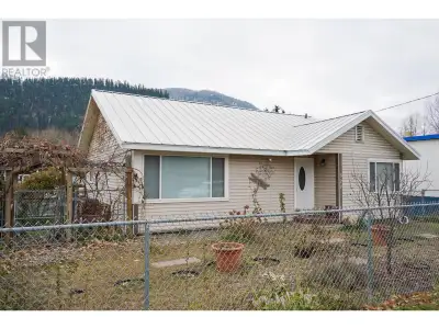Lots of potential and options in this centrally located C2 zoned family home in the community of Cha...