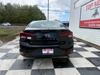 A practical compact sedan with efficient performance, modern convenience features, and a comfortable... (image 4)