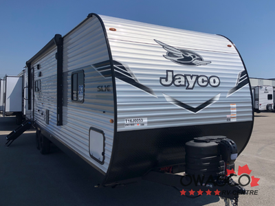 Jayco Jay Flight SLX travel trailer 295TBS highlights: Cargo Door Under Bunks U-Shaped Dinette 18' P...