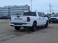 The 2026 Ram 1500 Black Express Crew Cab combines practical capability with a clean, modern design.... (image 6)