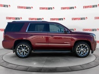 You can find this 2016 GMC Yukon Denali and many others like it at Stampede Auto. Treat yourself to... (image 5)