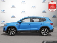 New Price! Odometer is 3459 kilometers below market average! Blue 2023 Volkswagen Taos Highline AWD... (image 1)