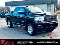 The 2022 Ram 2500 Laramie 4x4 Crew Cab with a 6'4in. box is a heavy-duty truck featuring a 6.4L V8 e... (image 1)