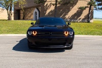 2021 Dodge Challenger SXT AWD delivers classic American muscle styling, everyday comfort, and strong... (image 1)