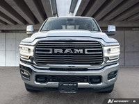 Command attention with this remarkable 2023 Ram 3500 Laramie Crew Cab, a freshly acquired trade-in t... (image 1)