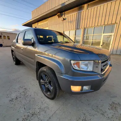 2009 HONDA RIDGELINE EX-L 4x4 Pickup Truck. Active. Clean interior/exterior. Dependable truck in exc...