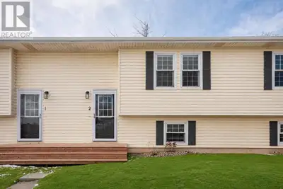 Welcome to Unit #2, 14 Marshall Street, a well-maintained 2-bedroom, 1-bath split-entry condo in the...