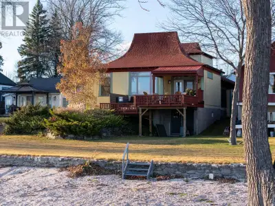 Welcome to 3765 Crystal Beach Drive, lakeside living at its finest! The beautifully designed home si...