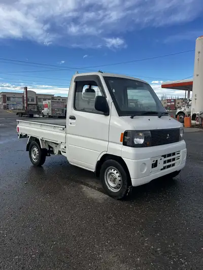Looking for a reliable, fuel-efficient kei truck? This 2007 Mitsubishi Minicab is in excellent mecha...