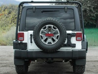 The 2018 Jeep Wrangler JK Unlimited Rubicon in stunning white with an all-wheel-drive system invites... (image 5)