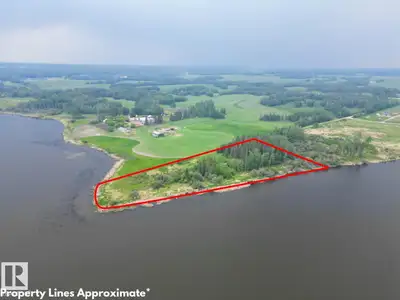 Rare opportunity to own 4.20+/- acres of private, treed land along the shores of Lake Isle. Offering...