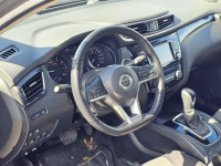 The 2023 Nissan Qashqai SV in a striking color, equipped with an automatic transmission and an all-w... (image 7)