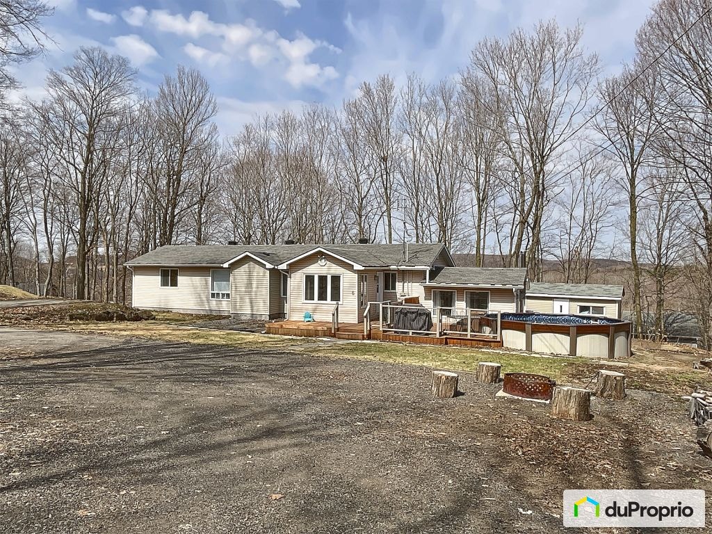 $424,900 - Bungalow for sale in Oka — photo 1