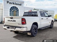This Ram 1500 boasts a Gas/Electric V-6 3.6 L/220 engine powering this Automatic transmission. WHEEL... (image 4)