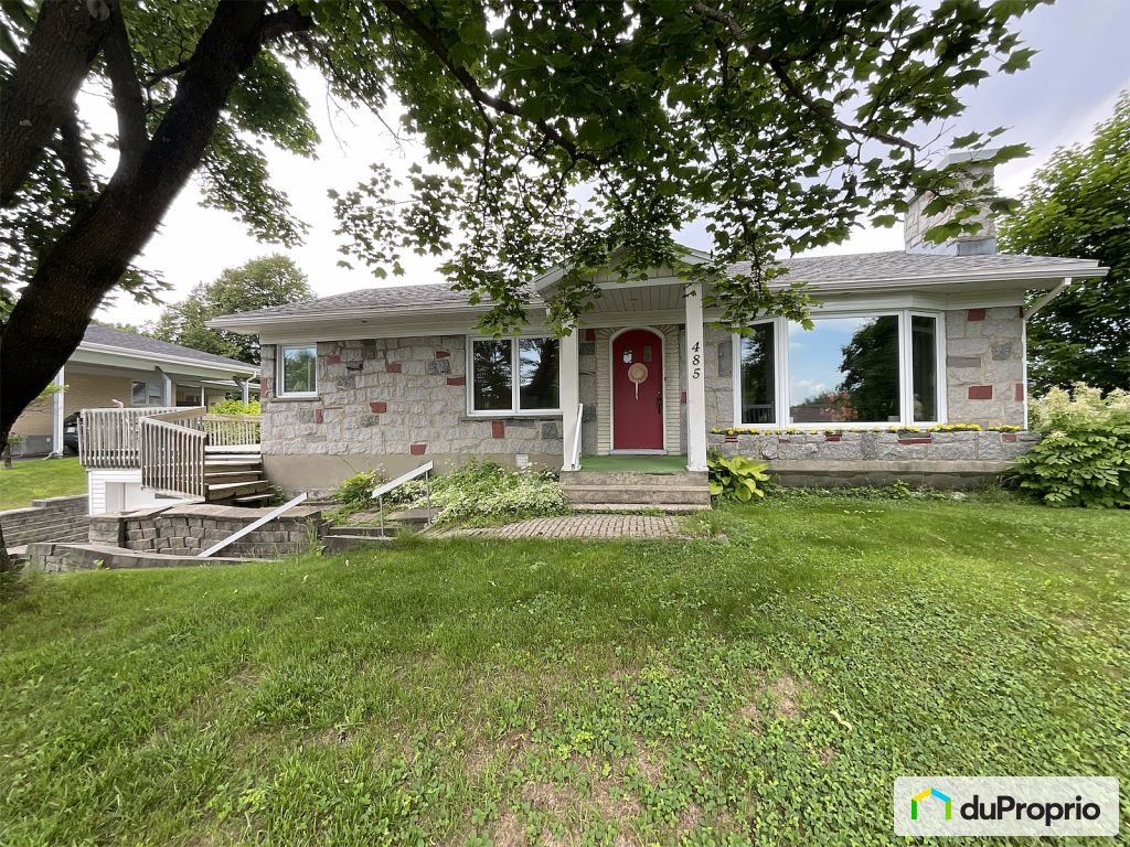 70e rue Est — photo 1