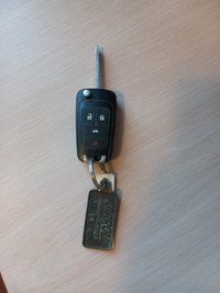 Remote key for 2013 Chevy Cruz.