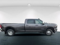 WAS: $118585 NOW: $109991 plus taxes and licensing feesThe new 2026 Ram 3500 Laramie 4x4 Crew Cab wi... (image 4)