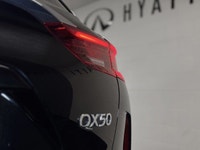 The 2021 INFINITI QX50 Essential is a premium-mid-level trim that elevates the compact luxury SUV ex... (image 6)
