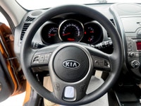 A fun and practical compact hatchback with unique styling, a roomy interior, and sporty design detai... (image 9)