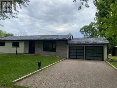 Welcome To This Charming Fully Reno'd 3 bed 2 bath Bungalow With Lake Views from Back Yard. No Expen...