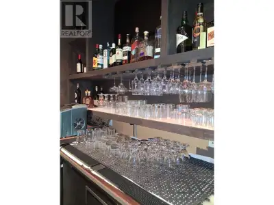 Exceptional opportunity to own and operate a fully equipped restaurant and bar in the heart of Maple...