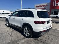 This 2023 Mercedes-Benz GLB 250 Sport Utility, presented in crisp Polar White, redefines compact lux... (image 7)