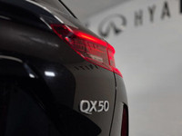 The 2021 INFINITI QX50 LUXE is a compelling compact luxury SUV that balances distinctive styling wit... (image 6)