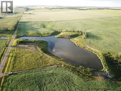 A Rare 13.02-Acre Retreat with Private Pond and Services – The Bennett Pond PropertyDiscover a truly...