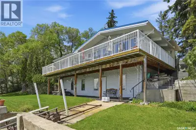 Welcome to 396 Pasqua Lake Road, a year-round waterfront retreat offering 100 feet of beautiful shor...