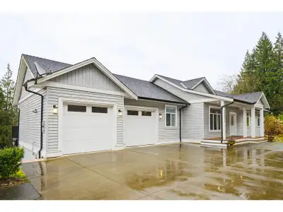 Gorgeous Custom-Built rancher w/ walk-out basement, perfectly set on a serene 5-acre parcel in the h...