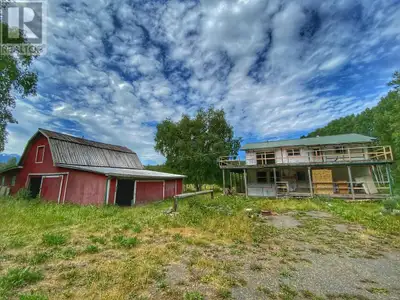 This home, with Skeena River frontage, has loads of potential after some TLC. Massive kitchen with a...