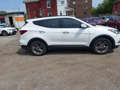 . 2017 Hyundai Santa Fe Sport -Low Km's- 120,000 km- 2.4L 4Cyl -AWD with Automatic Transmission. Whi...