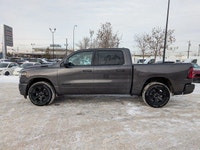 The 2026 Ram 1500 Sport in Granite Crystal Metallic delivers bold style and confident capability. It... (image 2)